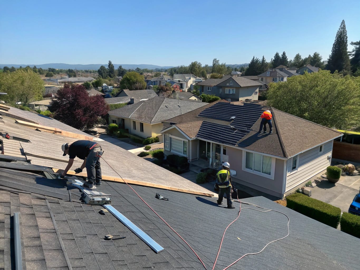 Professional roofing crew installing new tile roof on Concord home with cost breakdown overlay